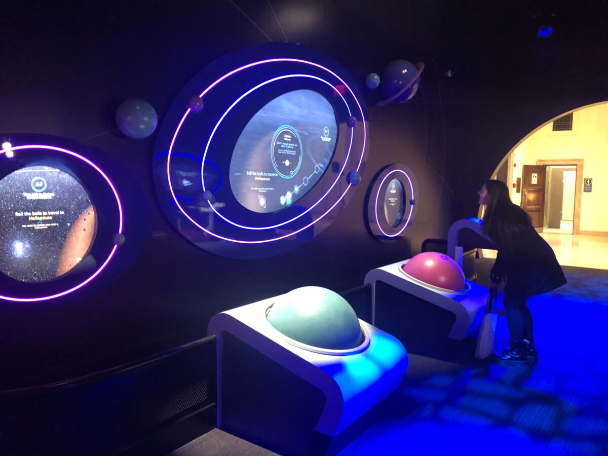 Giant track balls allow users to navigate through space.