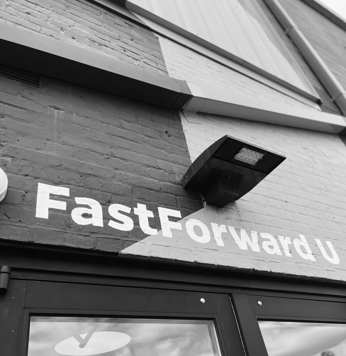 Black-and-white photo of FastForward U's exterior.