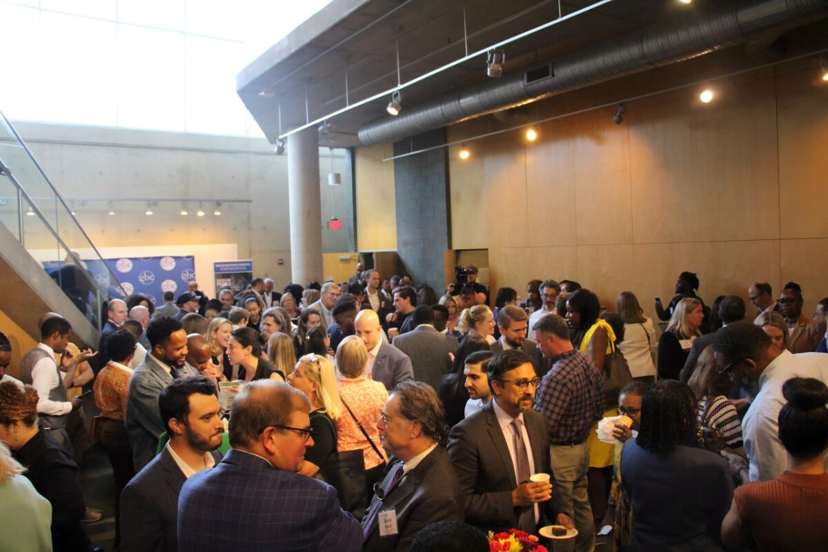 Crowd networks in room with brown and grey walls