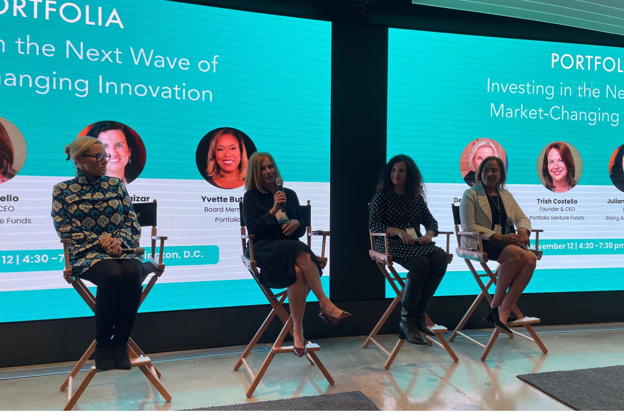 Four women seated on stage in front of a screen with a presentation titled "Investing in the Next Wave of Market-Changing Innovation.