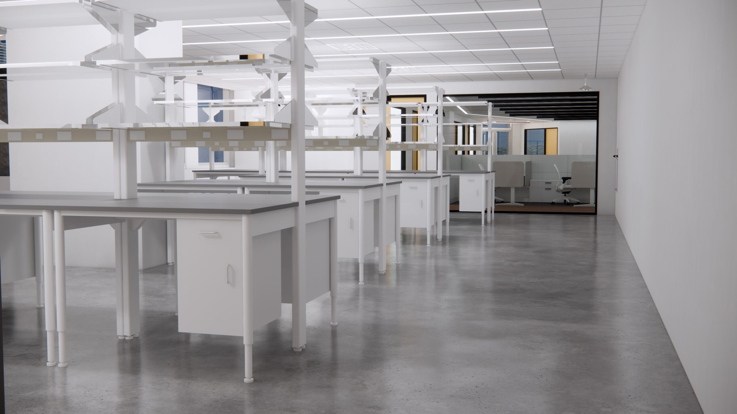 A modern laboratory with white workstations, a polished concrete floor, and fluorescent lighting. Glass doors and office space are visible in the background.